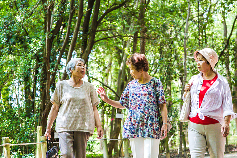 Elderly women who are walking in the nature